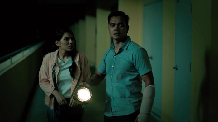 Possessed: Zamri with student. 