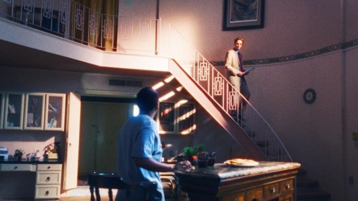 Primetime Movie: Chris Hansen (Robert Pattinson) descends the stairs, looking disapprovingly on his latest catch