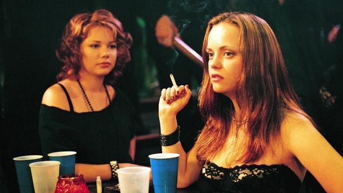 Prozac Nation: Michelle Williams and Christina Ricci sit together in a bar, Ricci holding a cigarette