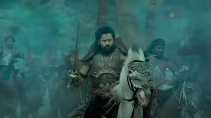 Ponniyin Selvan -- Part II: A character advances in battle with a sword on a horse