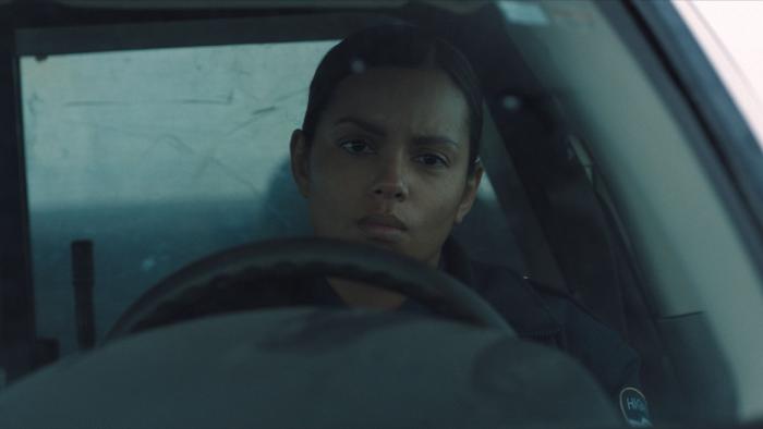 Psycho Killer Movie: Highway patrol officer Jane Archer (Georgina Campbell) sits in her cruiser