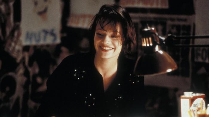 Pump Up the Volume: Samantha Mathis smiles as she sits in her bedroom listening to the radio