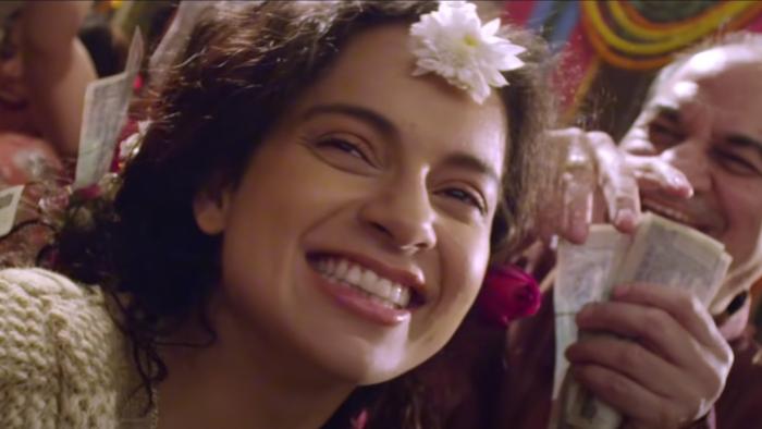 Queen: Rani enjoying and smiling during a marriage ritual.