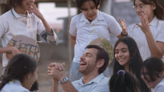Radical Movie: Sergio and his students laugh during a school activity