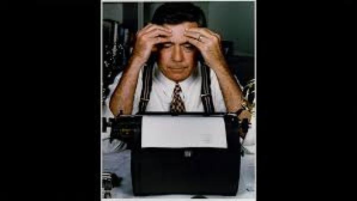 Rather: Younger Dan Rather with hands on head