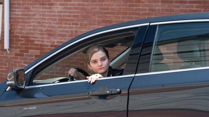 Ray Donovan: The Movie: Kerris Dorsey sitting in a car.