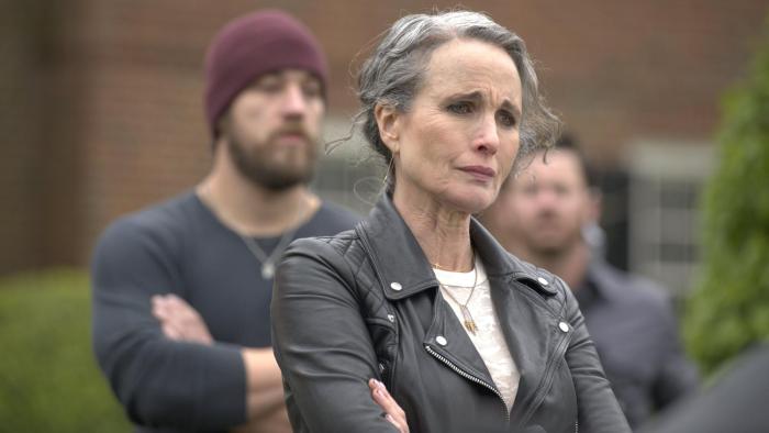 Red Right Hand Movie: Big Cat (Andie MacDowell) stands in front of her compound, some of her hired men behind her, looking distraught