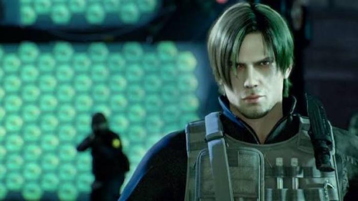 Resident Evil: Damnation: Serious-looking man in a tactical vest, background of glowing green circles.