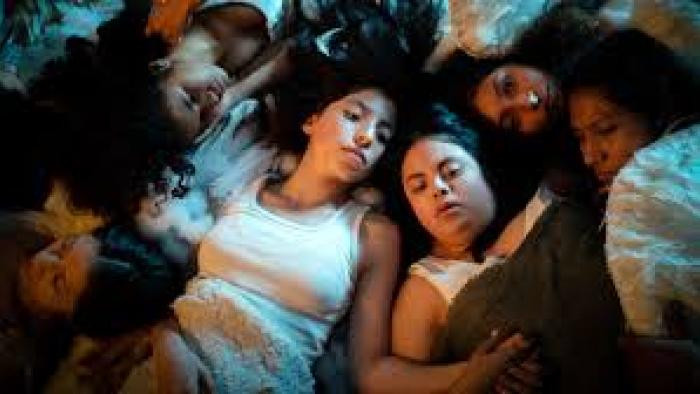 Rita scene 1: Multiple teens lying together on the floor
