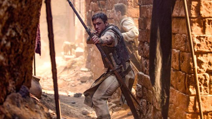 Robin Hood (2018) Movie: Robin Hood with his bow 