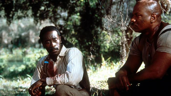 Rosewood Movie: Sylvester Carrier (Don Cheadle) and Mann (Ving Rhames).