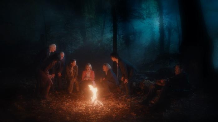 Rumours movie: Seven world leaders sit around a campfire in the woods