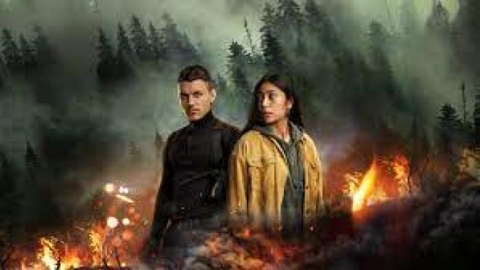 Sayen Movie Scene 2: A man and woman stand as a fire burns