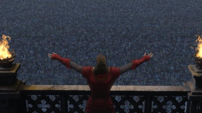 Scarlet movie: A king stands on a balcony with his hands outstretched, giving a speech to the masses