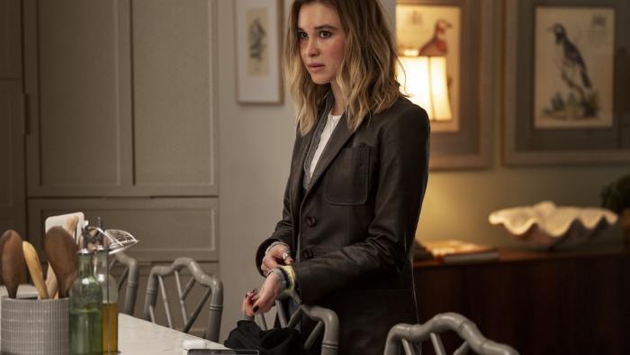 Scream 7 Movie: Tatum (Isabel May) adjusts the sleeve of a leather jacket with a dismissive look on her face