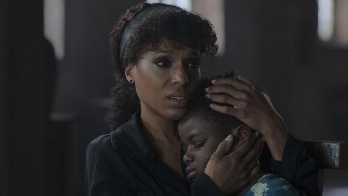 Shadow Force Movie: A visibly touched Kyrah (Kerry Washington) cradles her son Ky's head on her chest