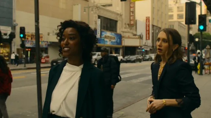 She Taught Love: Arsema Thomas and Taissa Farmiga on the street.