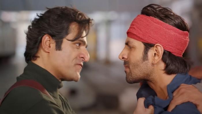 Shehzada movie: An Indian man grabs another by the collar