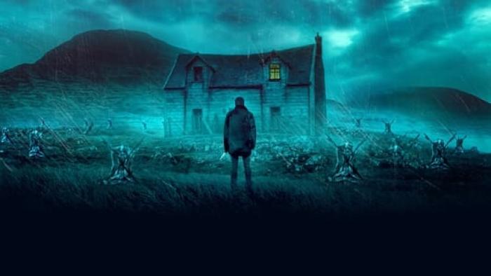 Shepherd movie: figure outside building