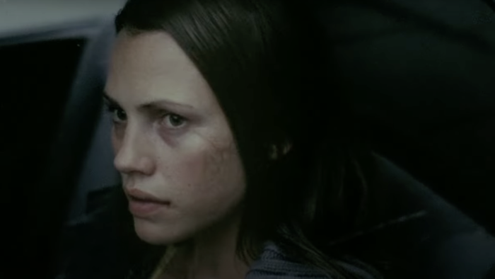 Shifty: A young White woman with a scar on her face