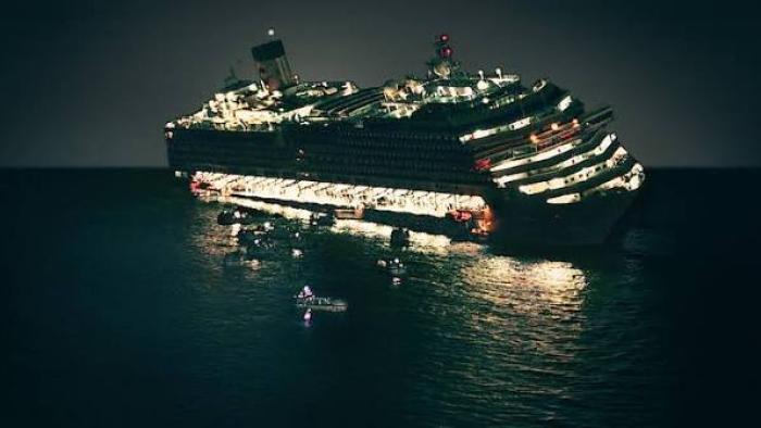 Shipwrecked: Nightmare at Sea: Cruise ship listing at night with lifeboats nearby.