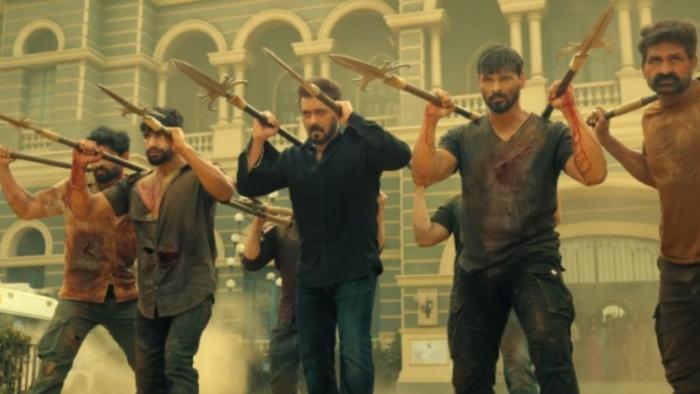 Sikandar: A row of men stand holding sharp spears in both hands