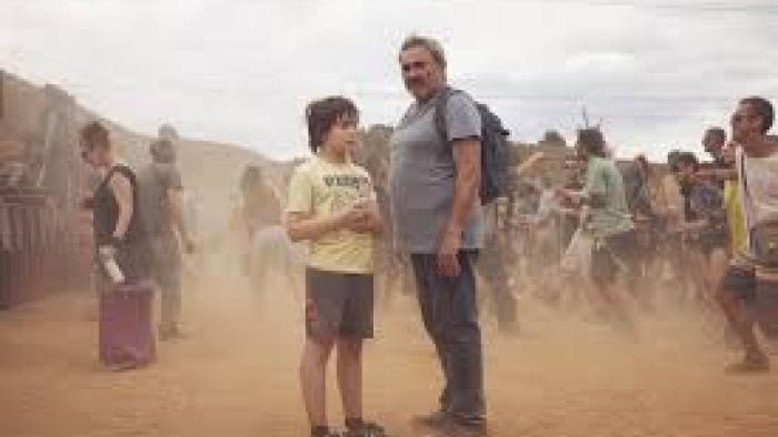 Sirāt: Father and son at rave.
