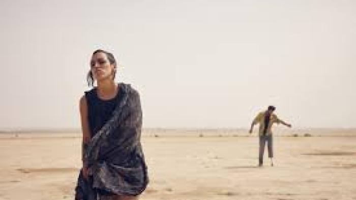 Sirāt: Dancing in the desert.