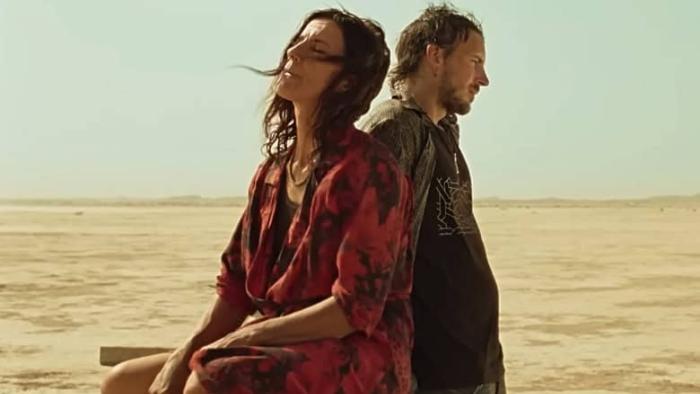 Sirāt: Drug trip begins in the desert.