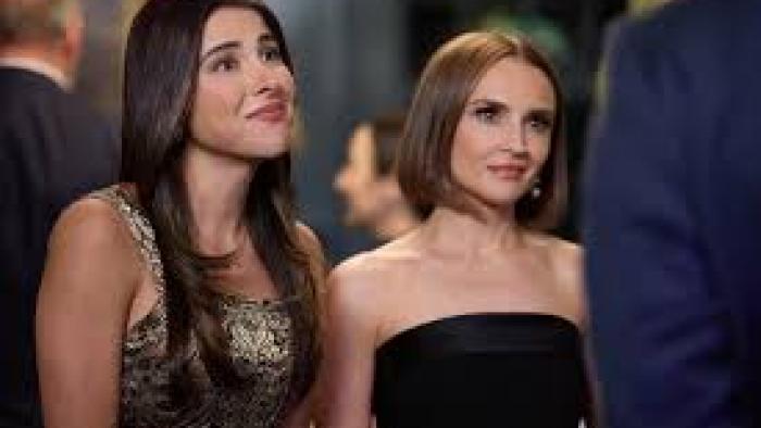 Sisterhood, Inc. Daniella Monet and Rachel Leigh Cook stand together