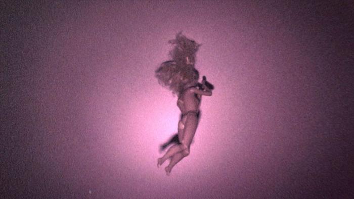 Skinamarink Movie: A doll appears to be stuck to the ceiling