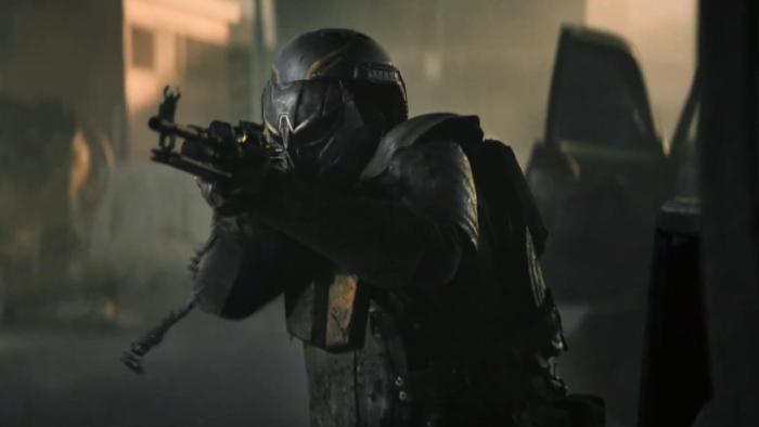 Sniper—No Nation: An armored soldier holding rifle and pointing it toward something out of shot