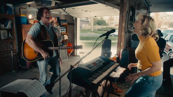 Song Sung Blue movie: Kate Hudson plays the keyboard, and Hugh Jackman sings and plays the guitar