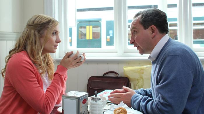 Still Life: Joanne Froggatt and Eddie Marsan sit opposite each other in a cafe, talking