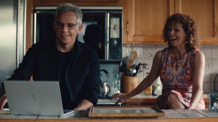 Stiller & Meara: Nothing Is Lost movie: Ben Stiller looks at a computer in his parents' kitchen while sister Amy looks over his shoulder, laughing