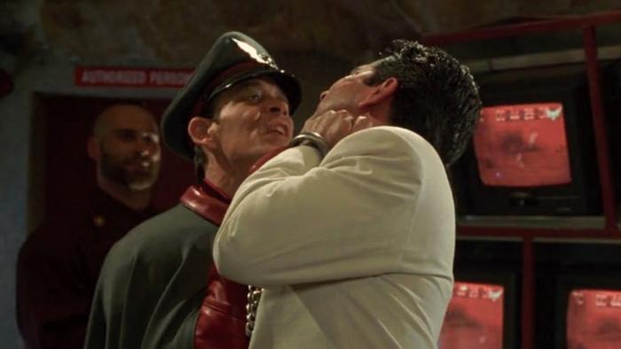 Street Fighter: Bison lifts Dr. Dhalsim by the throat