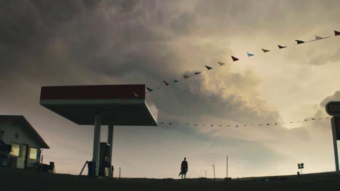 Supercell Movie: Long shot of a darkened figure in the middle of a storm