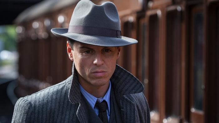 Swallows and Amazons: Andrew Scott in a trench coat and hat