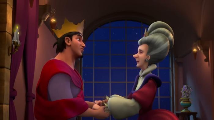 A king and queen stand hang and hand looking at each other