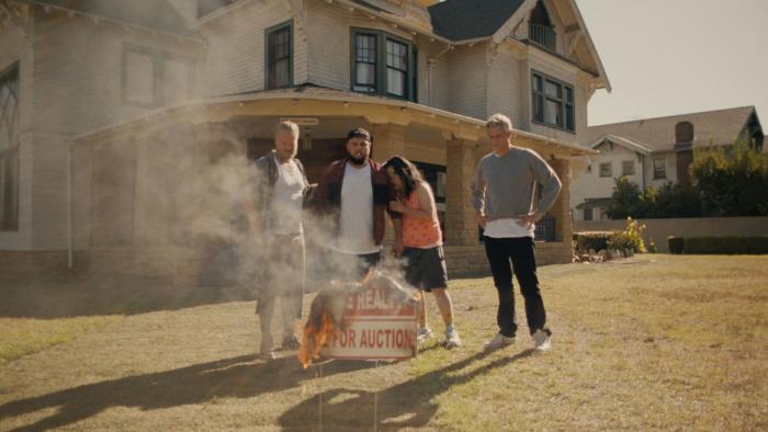 Sweet Dreams: Bobby Lee cries with three other men looking at a burning "For Auction" sign posted at their recovery house