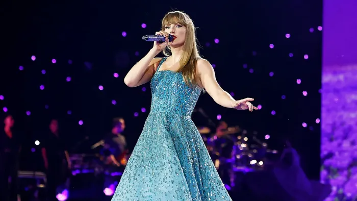 Taylor Swift: The Eras Tour –  The Final Show: Swift in blue dress.