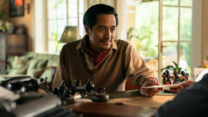 Tenzing: Genden Phuntsok in an office.