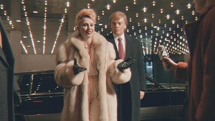 The Apprentice Movie: Maria Bakalova as Ivana Trump exiting a car, with Sebastian Stan as Donald Trump behind her