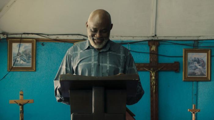 The Black Book: Paul preaches in his church. 