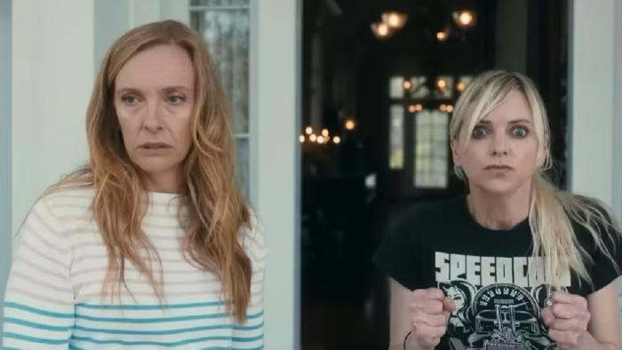 The Estate: Toni Collette and Anna Faris stand in front of a front door looking stressed.