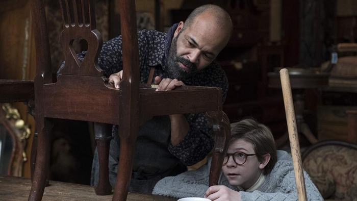 The Goldfinch Movie: Hobie and young Theo examine antique chair