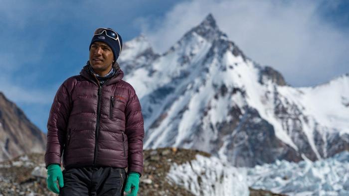 The Last First: Winter K2: Climber by a peak.