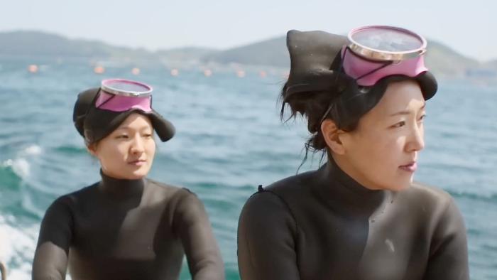 The Last of the Sea Women: Two women on a bat.