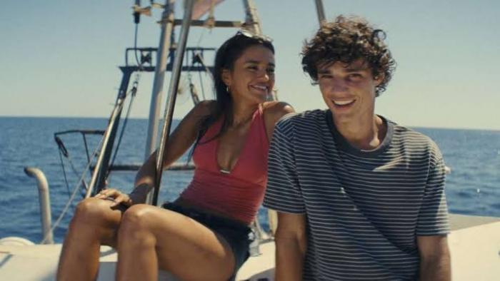 The Last Sunrise: Maia Reficco and Fernando Lindez on the beach.