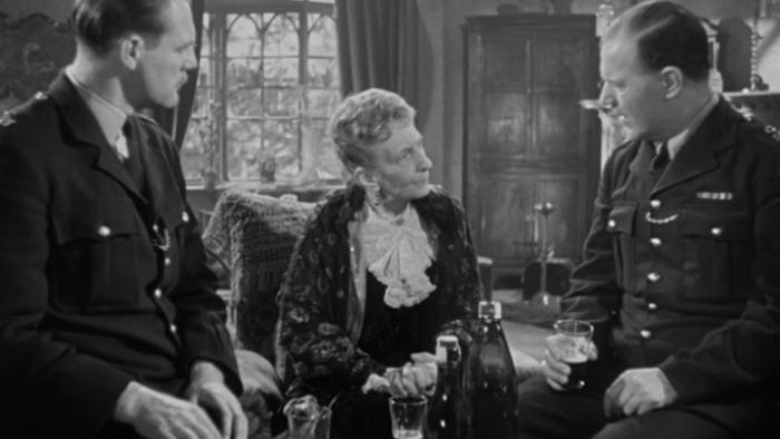 The Lavender Hill Mob: An elderly White woman speaks to two police officers